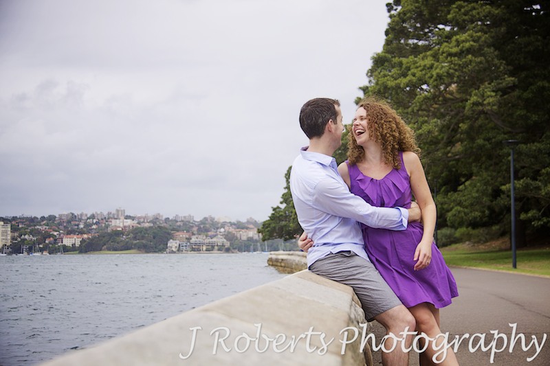 Laughing couple Mrs Macquarie's Chair Sydney - engagement photography sydney